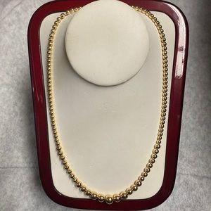 Krementa Gold Tone Bead Necklace